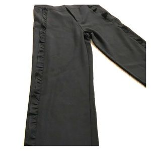 Pants with ruffle embellishments